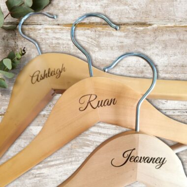 engraved wedding hangers - personalised wooden bridal party hangers by Crimson Laser